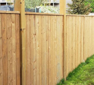 How to Maintain Wooden Fences Through All Seasons